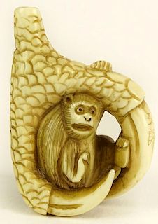 Vintage Japanese Ivory Netsuke. "Monkey in Claw"