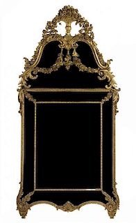 * A Regence Style Gilt Gesso Mirror Height 53 1/2 x width 40 inches.