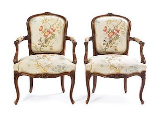 A Pair of Louis XV Style Fauteuils Height 33 3/4 inches.
