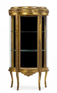 A Louis XV Style Giltwood Vitrine Height 56 x Width 28 x Depth 16 3/4 inches.