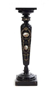 A Gilt Metal and Porcelain Mounted Ebonized Pedestal Height 43 inches.