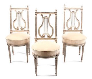 * A Set of Six Louis XVI Painted Side Chairs Height 38 inches.
