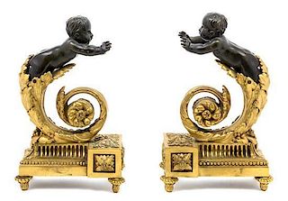 A Pair of Louis XVI Style Gilt and Patinated Bronze Chenets Height 10 1/2 inches.