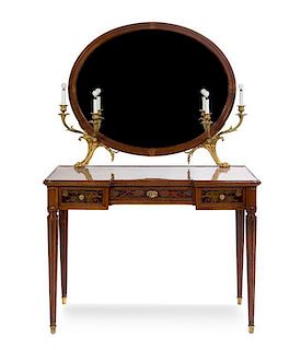 A Louis XVI Style Gilt Bronze Mounted Kingwood Dressing Table Height 60 1/4 x width 41 x depth 20 1/2 inches.
