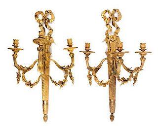 A Pair of Louis XVI Style Gilt Bronze Three-Light Sconces Height 29 1/2 inches.