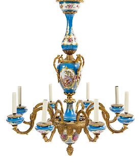 A Sevres Style Porcelain Mounted Gilt Bronze Eight-Light Chandelier Height 26 3/4 x diameter 26 1/4 inches.