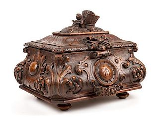 * A Black Forest Carved Table Casket Width 17 inches.