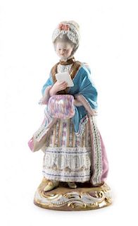 A Meissen Porcelain Figure Height 7 1/2 inches.