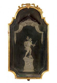 An Italian Giltwood Mirror Height 37 x width 19 1/2 inches.