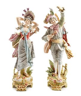 A Pair of Majolica Figures Height of taller 34 inches.