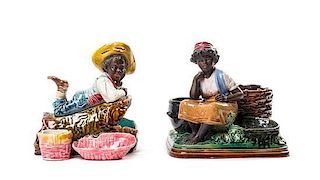 A Pair of Majolica Figural Match Strikers Height of taller 7 1/2 inches.