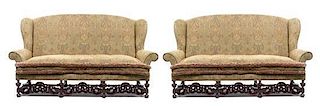 A Pair of Jacobean Style Sofas Width 88 1/2 inches.