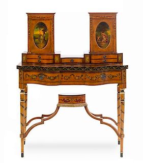 An Edwardian Painted Satinwood Work Table Height 52 1/2 x width 40 1/4 x depth 21 1/2 inches.