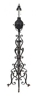 * A Wrought Iron Posset Cup Holder Height 69 inches.