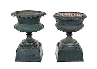 A Two Victorian Style Cast Iron Garden Urns Height 34 inches.