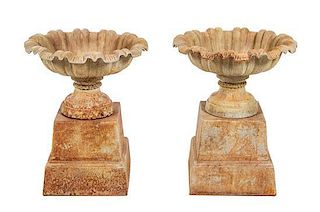 A Pair of Victorian Style Cast Iron Garden Urns Height 27 3/4 inches.