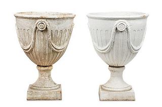 A Pair of Victorian Style Cast Iron Garden Urns Height 20 inches.