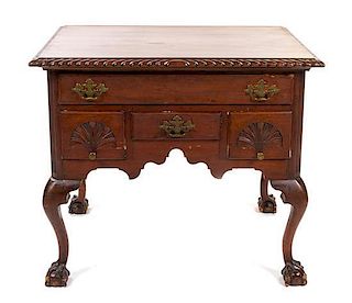 An American Chippendale Style Mahogany Lowboy 19TH CENTURY Height 28 1/2 x width 32 1/4 x depth 20 1/2 inches.