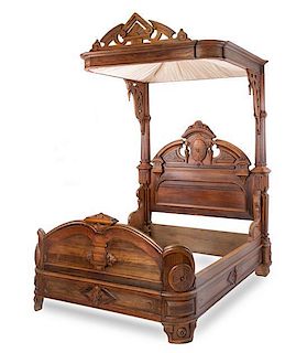 * A Rococo Revival Walnut Half Tester Bed Height 111 x width 73 1/2 x depth 87 1/2 inches.