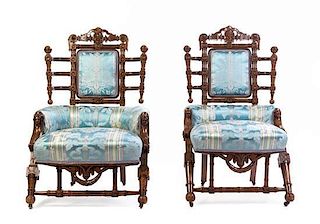 A Pair of Renaissance Revival Walnut Side Chairs Height 40 1/2 inches.