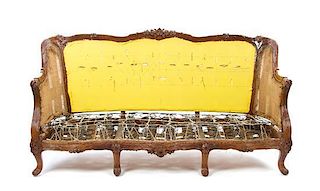 An American Mahogany Wingback Sofa Height 33 3/4 x width 70 x depth 32 inches.