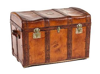 A Continental Leather Steamer Trunk Height 26 x width 38 x depth 23 inches.