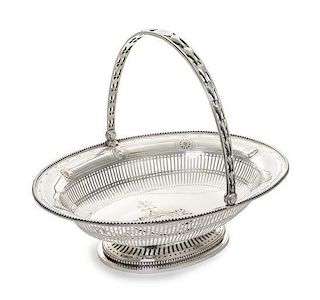 A George III Silver Basket, Thomas Heming, London, 1778, the oval basket applied with beaded rim above applied profiles alternat