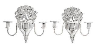 A Pair of Sheffield Silver-Plate Three-Light Sconces, 19th Century, each backplate worked with rampant lions flanking a coronet.