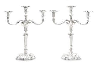 A Pair of Italian Silver Three Light Candelabra, Buccellati, Mid 20th Century, each with a baluster standard issuing scroll arms