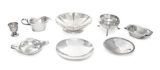 * A Group of German Silver Small Table Articles, 20th Century, comprising a creamer, a six-lobe footed bowl, an egg cup, a small