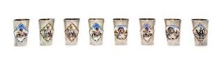 * A Set of Eight German Silver and Enamel Cordials, , each of cylindrical tapering form, decorated to show Egyptian travel scene
