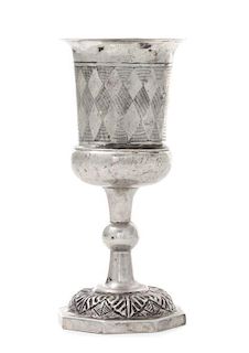 A Continental Silver Goblet, Probably Polish, 19th Century, of baluster form, the body with incised diamond decoration, the foot