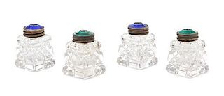 A Set of Four Norwegian Silver Mounted Cut Glass Casters, , having circular lids with guilloche enamel.