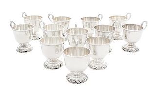 A Set of Twelve Silver-Plate Punch Cups, Mid 20th Century, of handled form, raised on stepped circular foot