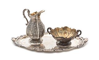 A Spanish Silver Creamer and Sugar Set, , including an oval tray, each decorated with shellwork and foliate scrolls.