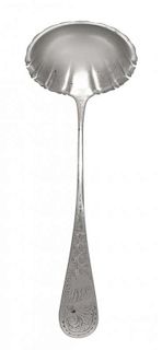 An American Silver Soup Ladle, Whiting Mfg. Co., New York, NY, bright cut with Aesthetic decoration, monogrammed.