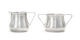 An American Silver Creamer and Sugar Bowl, S. Kirk & Sons, Baltimore, MD, of plain bulbous form.