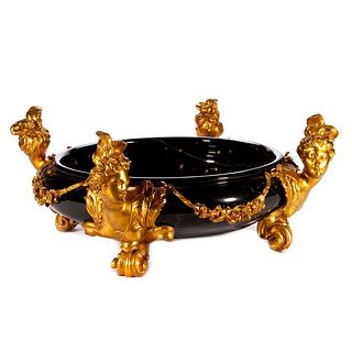 A marble and gilt metal center bowl.