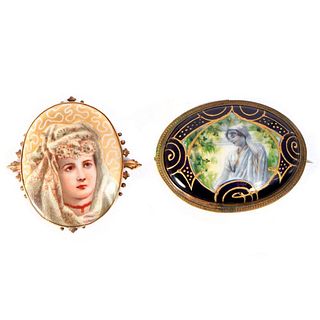 Two porcelain brooches.