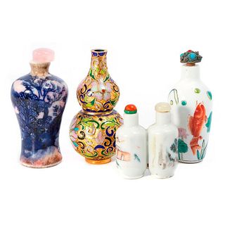 Four Chinese snuff bottles.