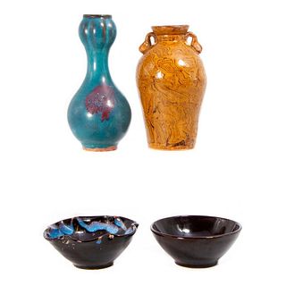 Four pieces of art pottery.