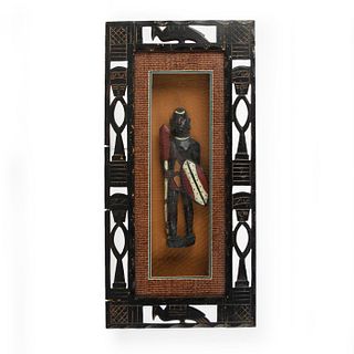 CARVED WOODEN AFRICAN FIGURINE.