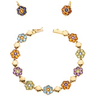 WRISTBAND AND EARRINGS SET WITH TOPAZ, AMETHYSTS, CITRINES AND PERIDOTS. 18K YELLOW GOLD