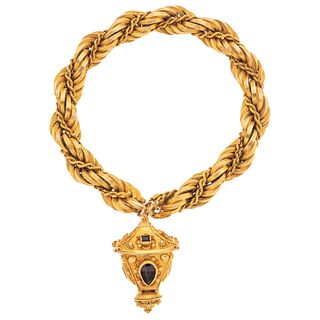 WRISTBAND AND PENDANT WITH GARNETS. 18K AND 8K YELLOW GOLD 