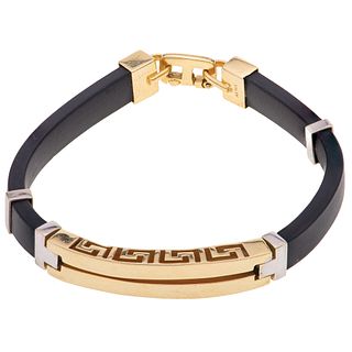 BRACELET IN RUBBER WITH 14K WHITE AND YELLOW GOLD. Weight: 21.8 g. Length: 8" (20.5 cm)