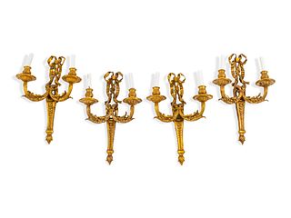 A Set of Four Louis XV Style Gilt Bronze Two-Light Sconces
