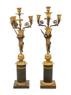 A Pair of Empire Style Gilt and Patinated Bronze Figural Candelabra