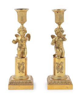 A Pair of Louis XVI Gilt Bronze Figural Candlesticks