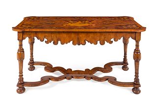 An Italian Carved and Satinwood Inlaid Walnut Center Table