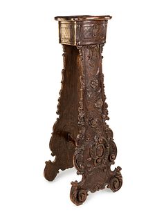 An Italian Baroque Style Carved Walnut Pedestal 